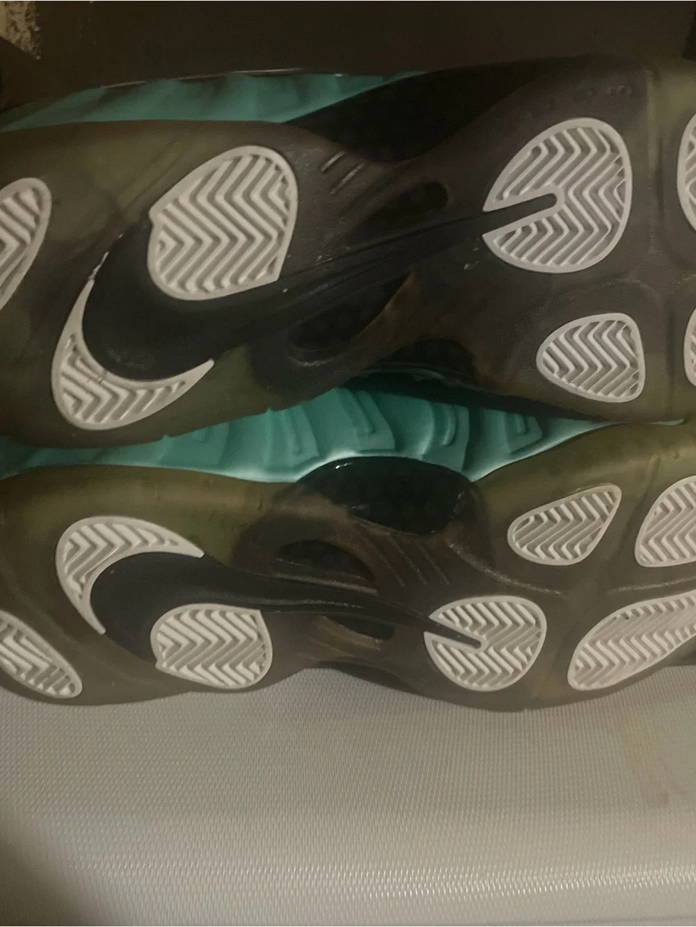 Nike men’s  Foamposite Sneakers in Teal and Black